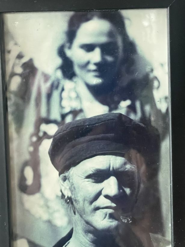 An old framed photo, kept on the wall